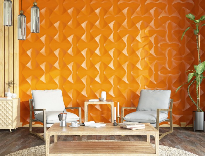 Cozy room featuring modern wooden furniture, orange geometric wall design, and stylish hanging lamps in Edmonton, AB