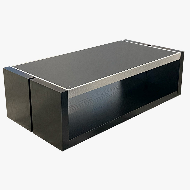 Modern black coffee table with a silver top, at Mobler Furniture in Edmonton, CA